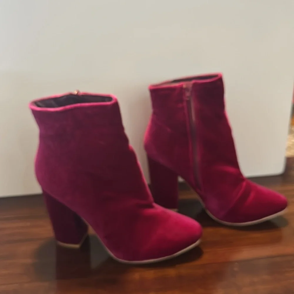 New but tried on Velvet Pink Ankle Boots. Size 9.5. Zip on side. Heel 4”.